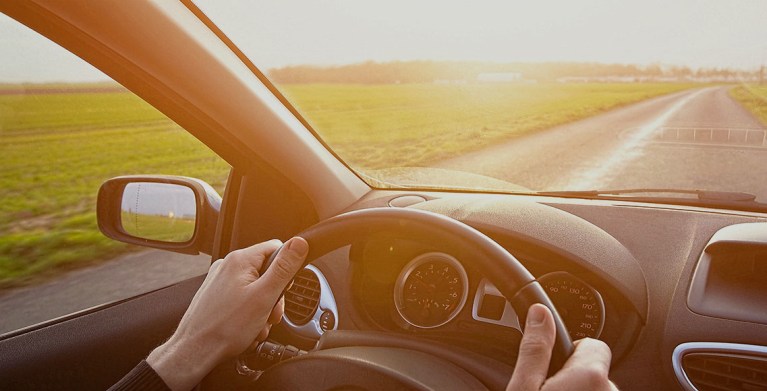 AAA Member drives down the open road