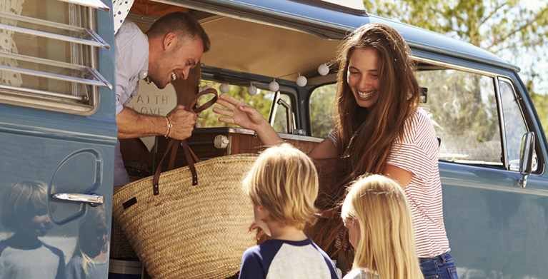 AAA family members unloading van and having a picnic.  