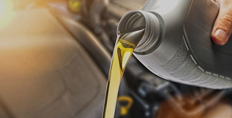 AAA Car Repair & Maintenance approved shop replaces the oil in a AAA Member's vehicle