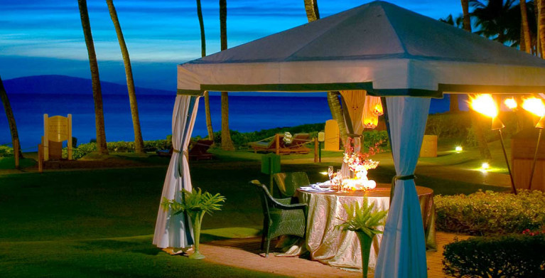 Cabana dining at night at the Grand Wailea Resort on Maui, Hawaii