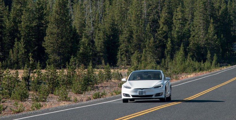 A Tesla on the highway outside of Shasta, California.