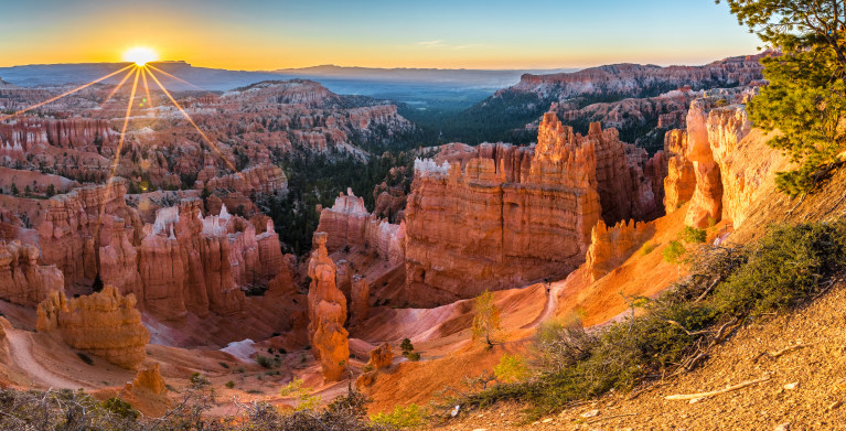A person hikes in Bryce Canyon National Park in Utah.