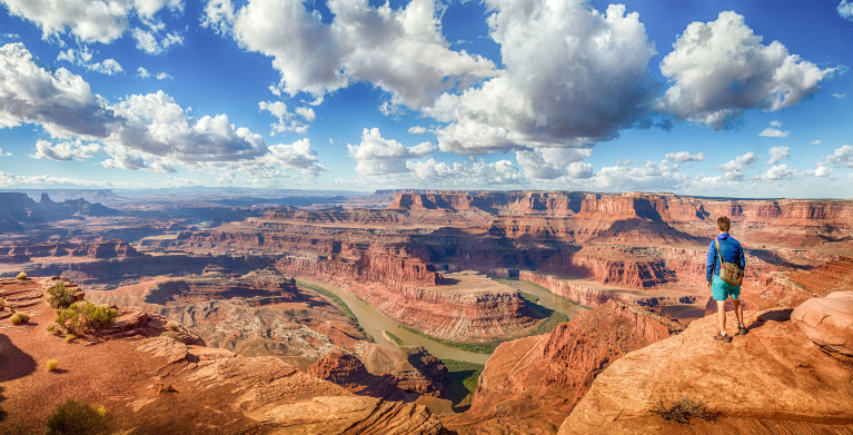 A visitor overlooks Dead Horse Point State Park in Utah.