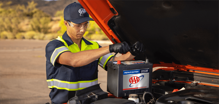 AAA roadside technician installs battery with member battery service