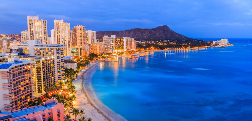 aerial view of hawaiian hotels on the coast