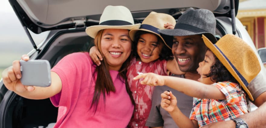 2 AAA members look at T Mobile phone