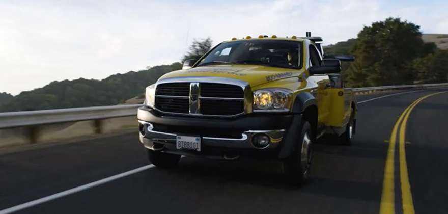 a aaa tow truck on the road in arizona