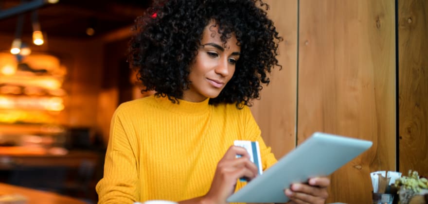 woman checking her Identity champion account