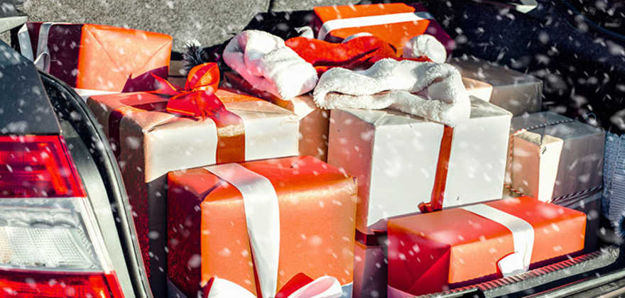 Trunk of a car full of wrapped presents