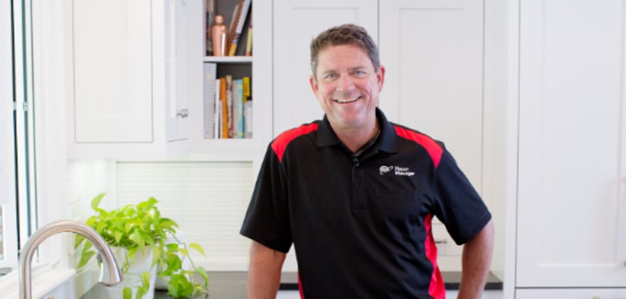 a friendly AAA House Manager inspects a home for maintenance and repairs