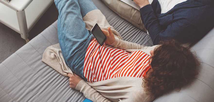AAA Members browse the internet on a laptop and phone