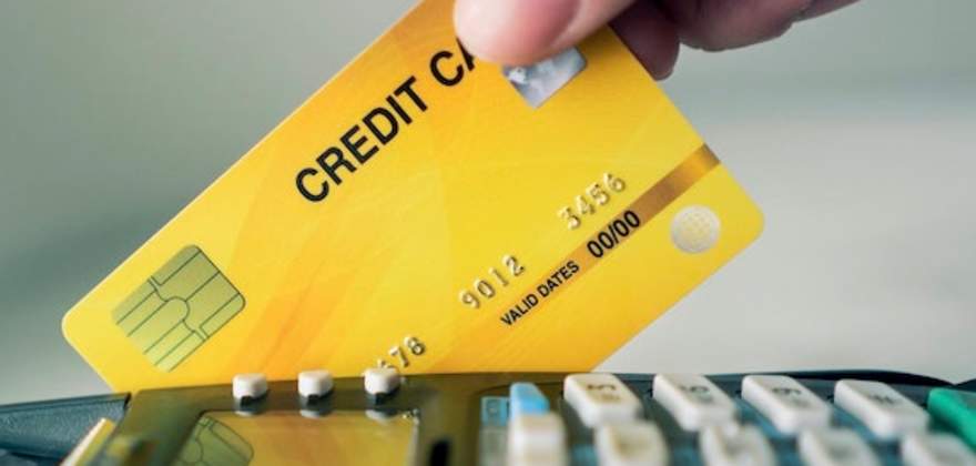 AAA Member swiping their credit card