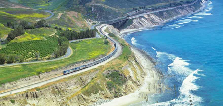 amtrak train traveling along pacific coast of the united states
