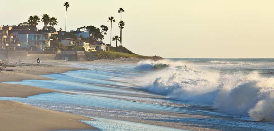 waves crashing on a beach in san diego