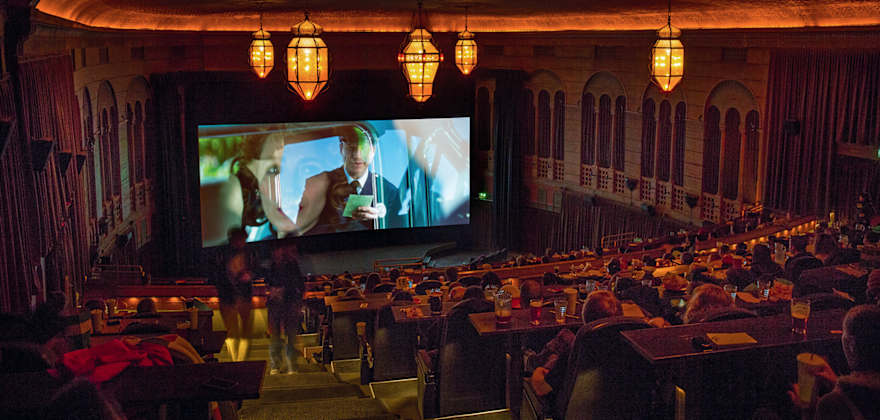 Portland's Bagdad Theater & Pub interior during movie screening.