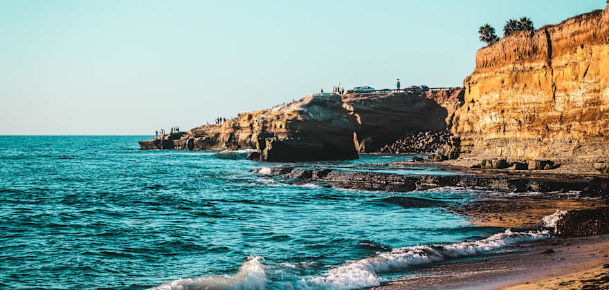 waves crashing on a beach in san diego