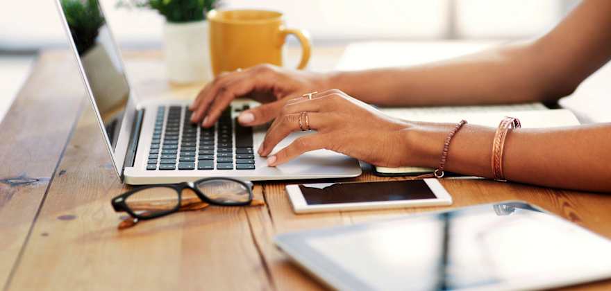 an underwriter on their computer assessing an insurance claim