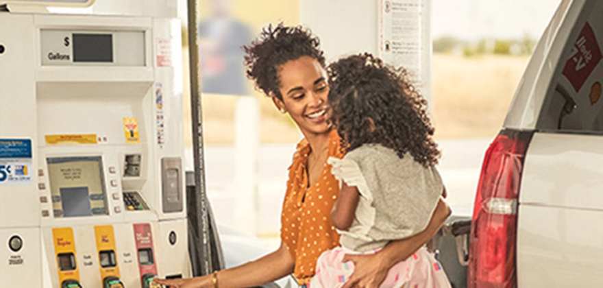 AAA Member pumping gas using the AAA discount for Shell Fuel Rewards
