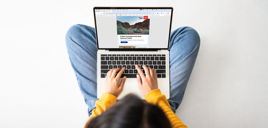 A person person reads the AAA Highlights email on their laptop.