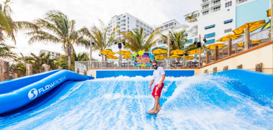 man on surf simulator at margaritaville hollywood resort
