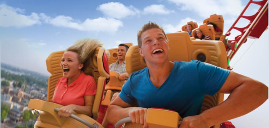 couple riding roller coaster at universal orlando resort