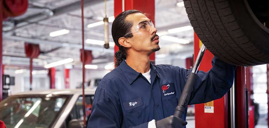 technician works on wheels 