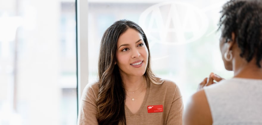 AAA branch representative helping member