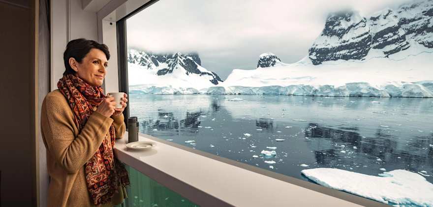 woman on nordic balcony on viking expedition ship