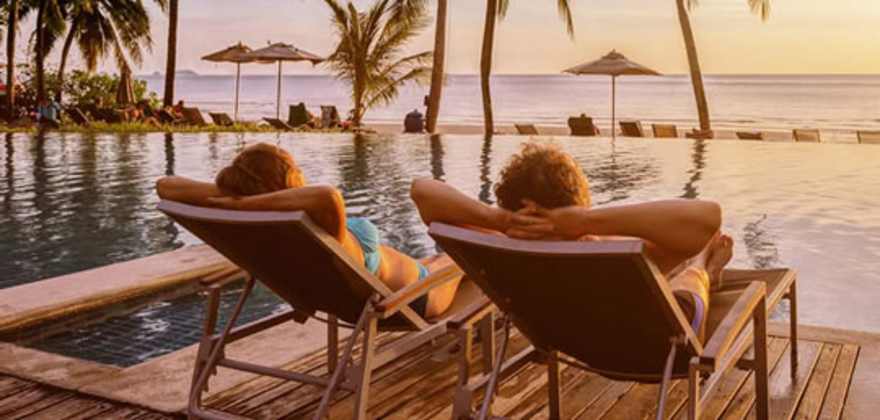 Woman meditating in the tropics