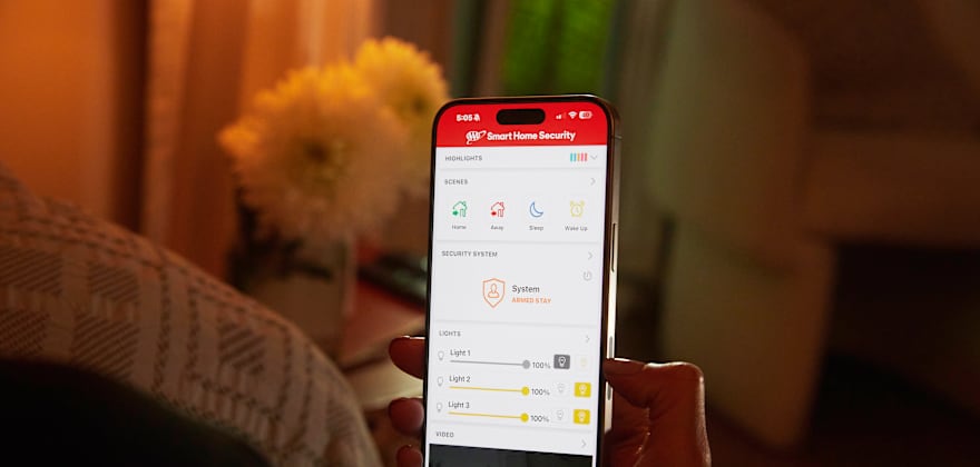 The AAA Smart Home Security app on a phone