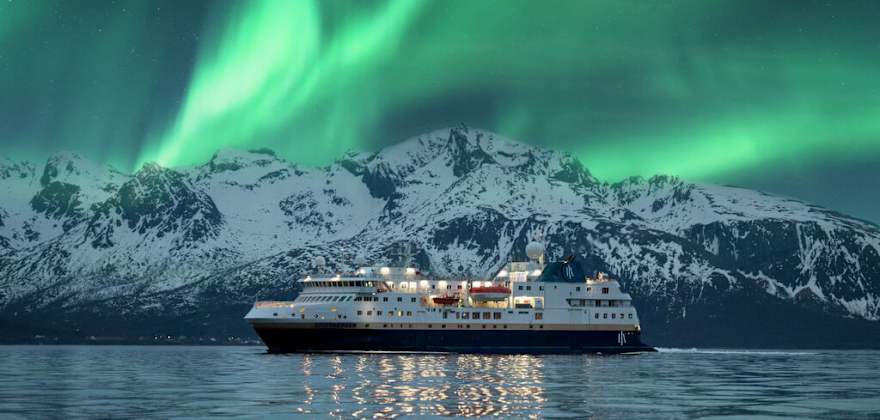 hurtigruten expeditions ship with northern lights