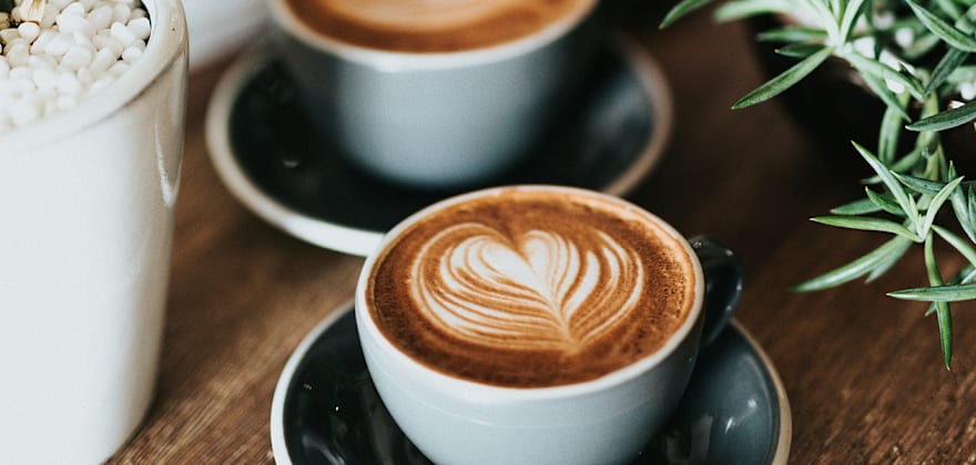 Table with coffee in a cup