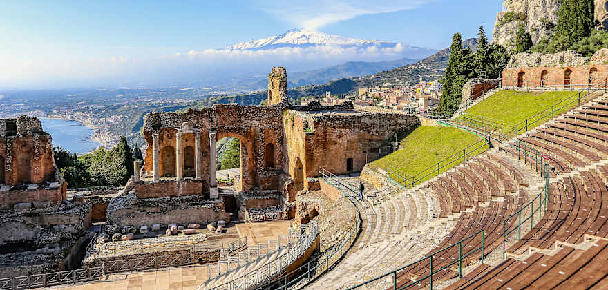 Antique Greek amphitheater, Taormina teatro greco on sunny day in Sicily, Italy.