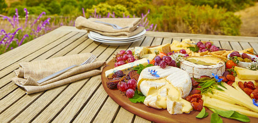Cheese from Point Reyes Cheese on a platter by the water in California.