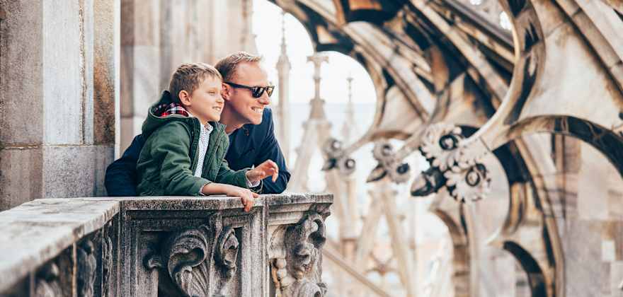 father with son on the roof of duomo di milano