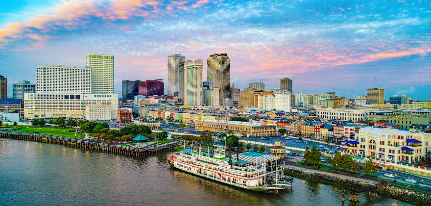 new orleans skyline with river in foreground