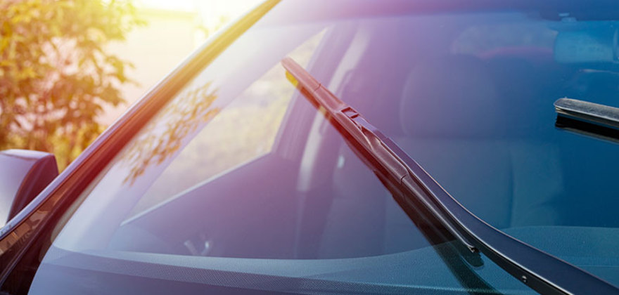 A AAA Member's windshield repaired by Safelite Auto Glass at sunset