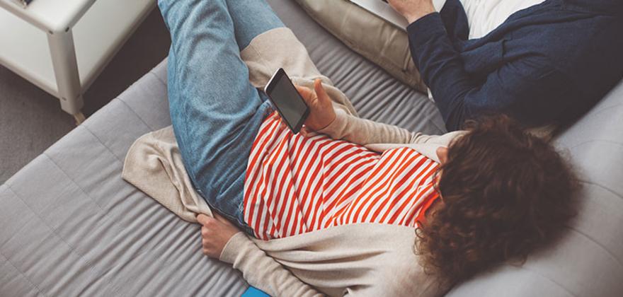 AAA Members browse the internet on a laptop and phone