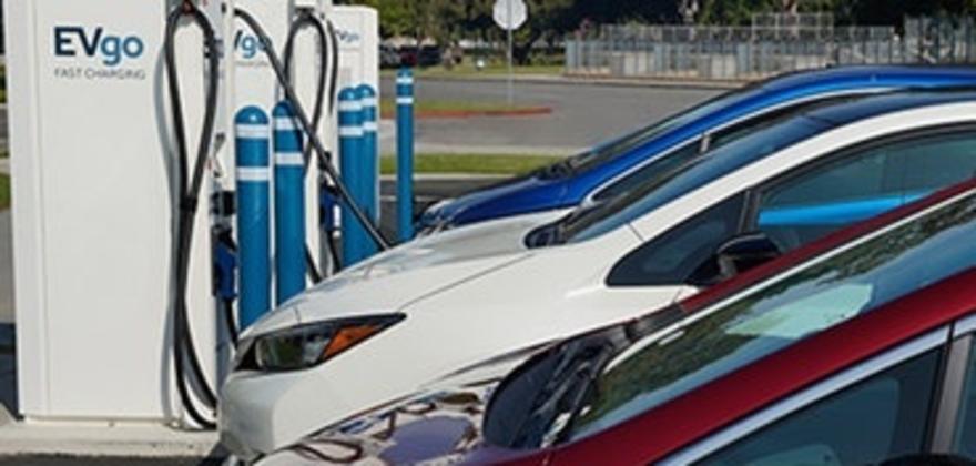 Electric vehicles charging at EVgo fast-charging stations