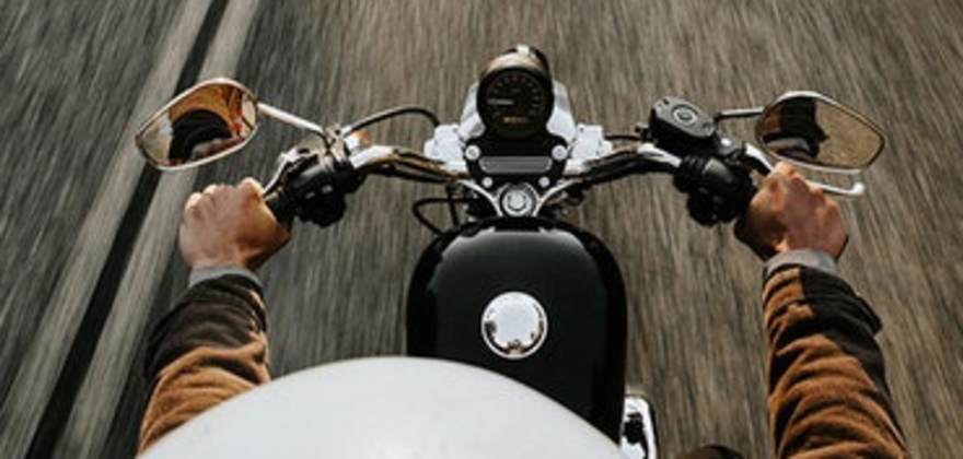 Motorcycle rider covered by AAA Insurance