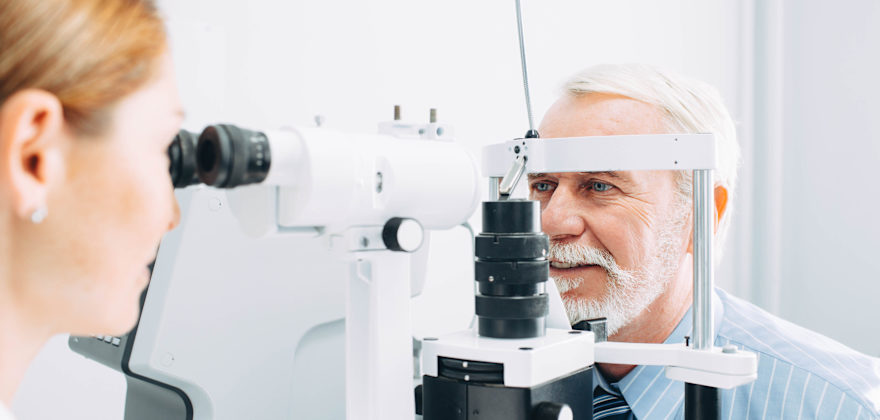 Senior man having an eye exam.