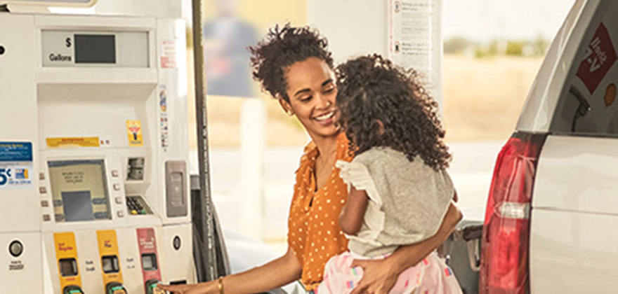 AAA Member pumping gas using the AAA discount for Shell Fuel Rewards
