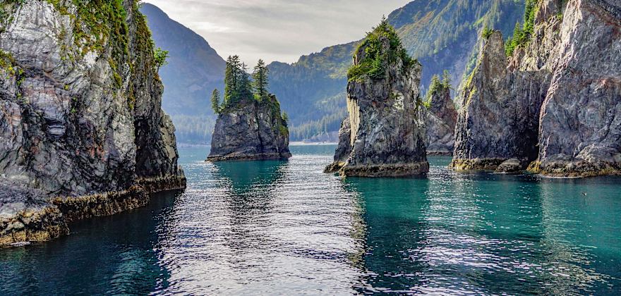 Rock Spires in the Turquoise Water of Spire Cove in the Kenai Fjords National Park.