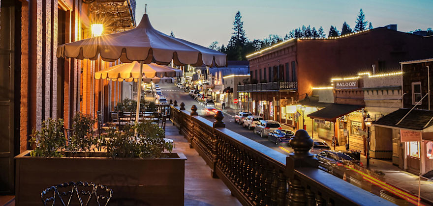 Outside the National Exchange Hotel in Nevada City, California at dusk.