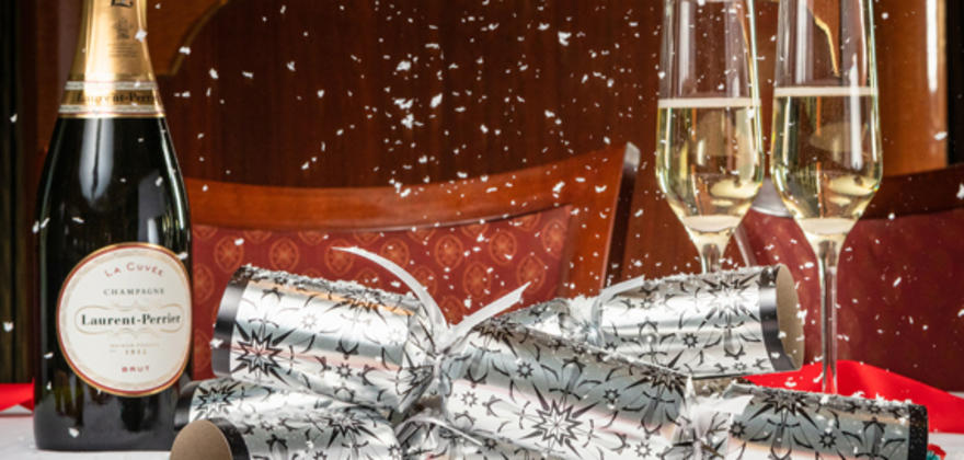 champagne and crackers on cunard holiday cruise