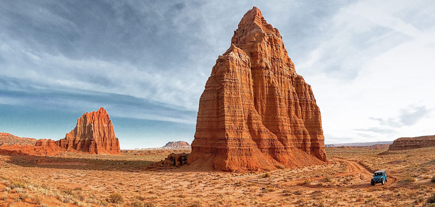 A Jeep drives through Capitol Reef National Park.