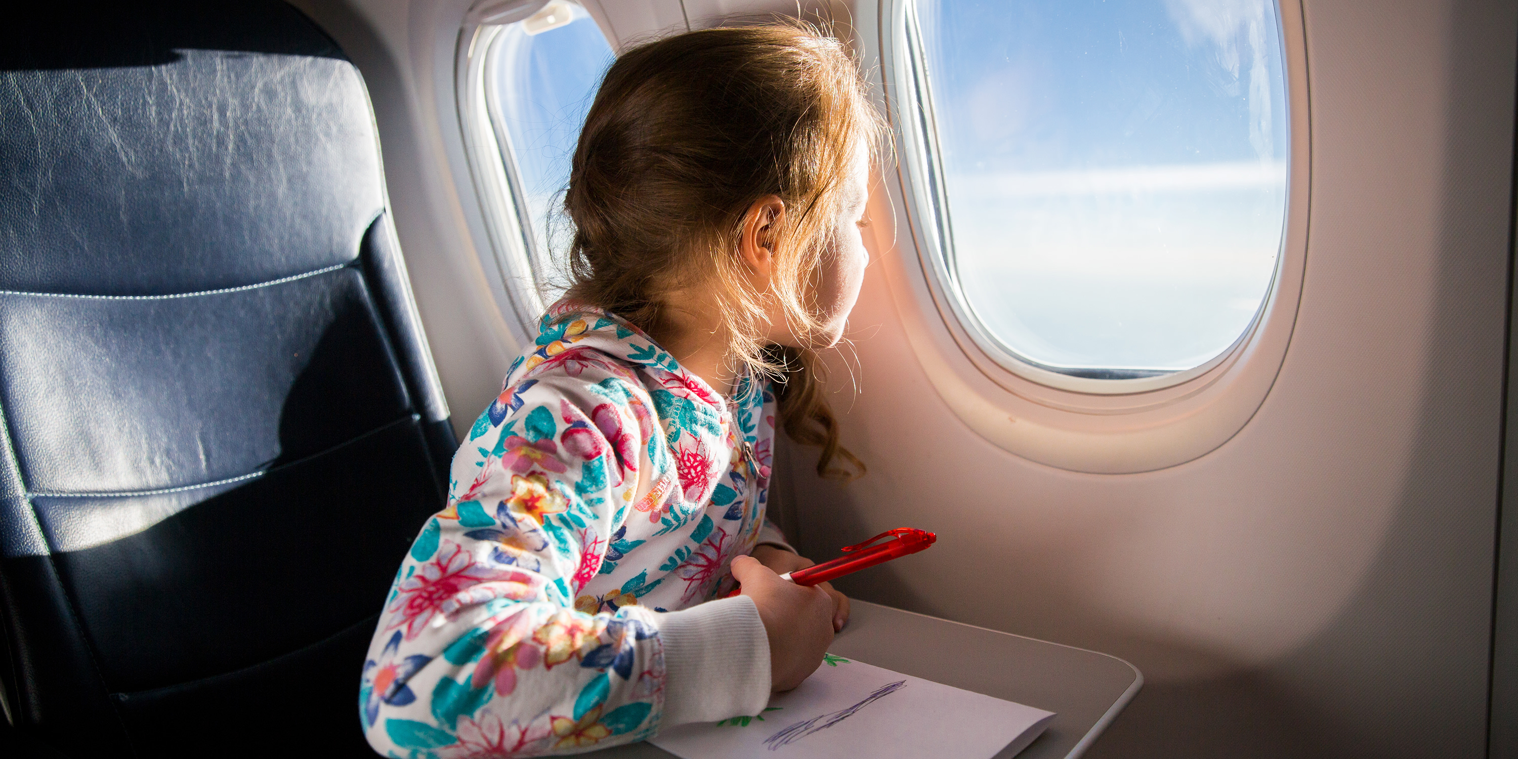 How to Travel Safely on a Plane With Kids This Summer