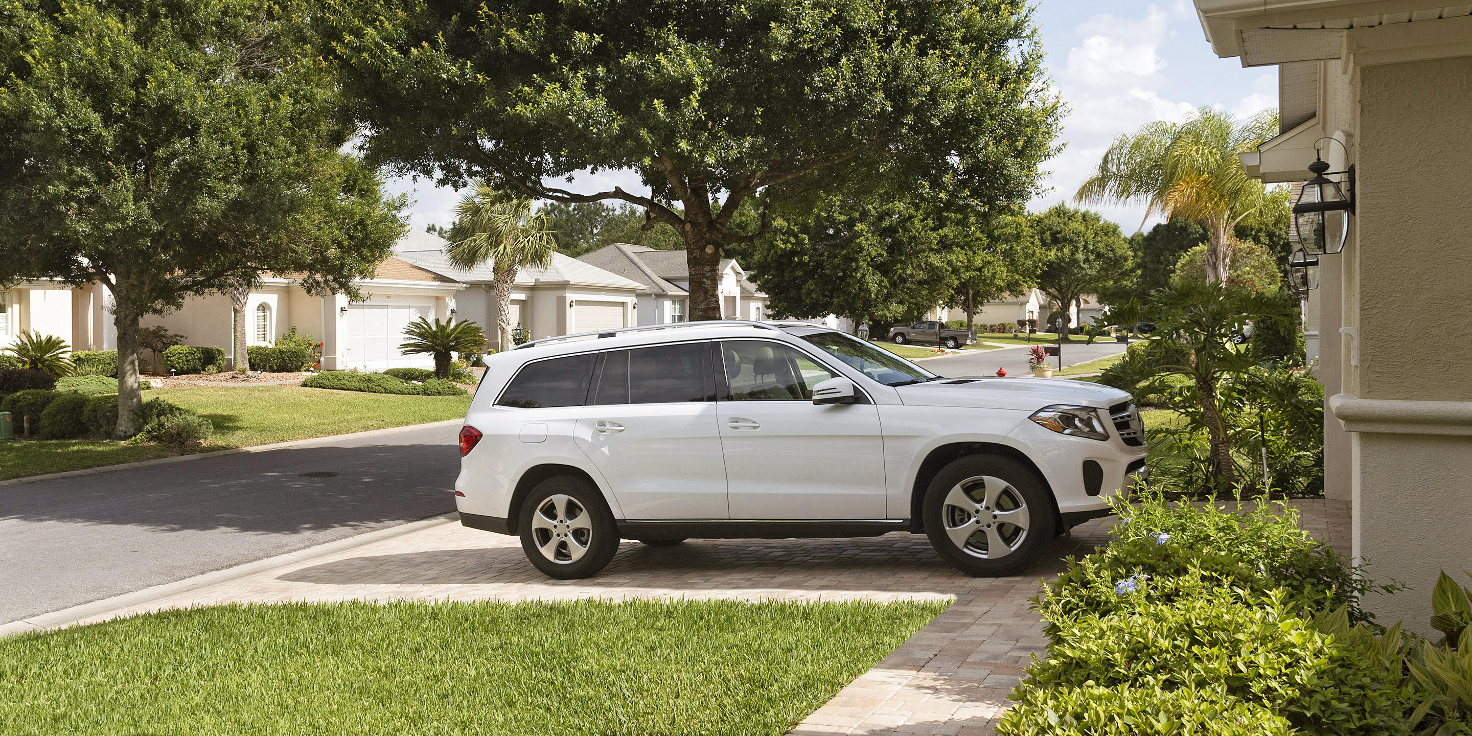 Tips For Parking And Storing Your Car For Extended Periods Via   Parked Car Driveway Aaa Via Magazine Shutterstock 649240660 V2  