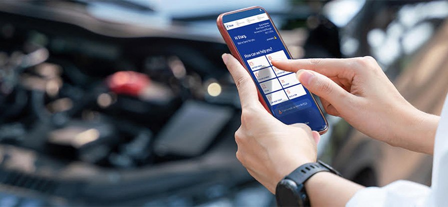 A driver requests emergency roadside service from the AAA Mobile app