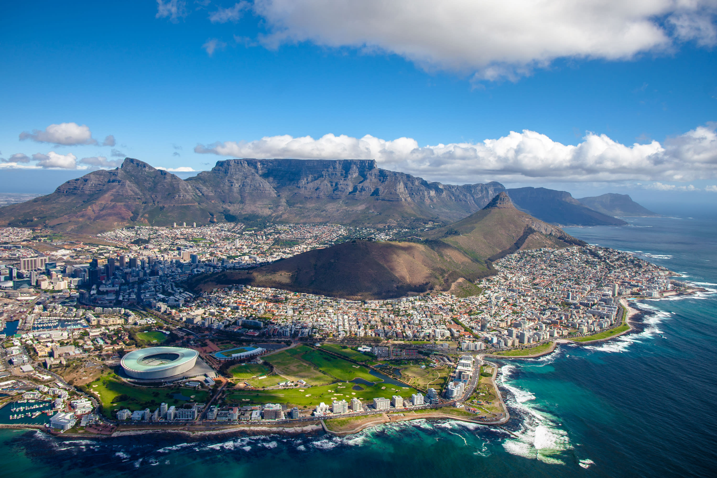 an aerial view of Cape Town, South Africa, with Table Mountain in the background, picture